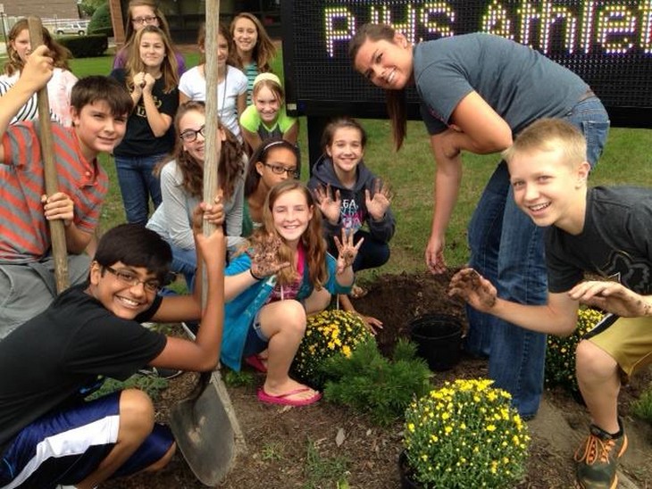 Students in School Activites (Athletics, Classrooms, Plays, Band, Art Projects) (PJHS Students Landscaping.jpg)
